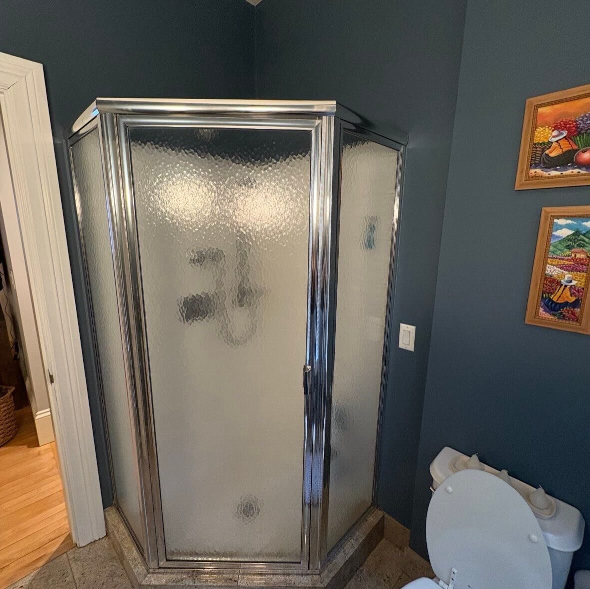 Before: Shower stall replaced with a tile shower and glass door, Boston