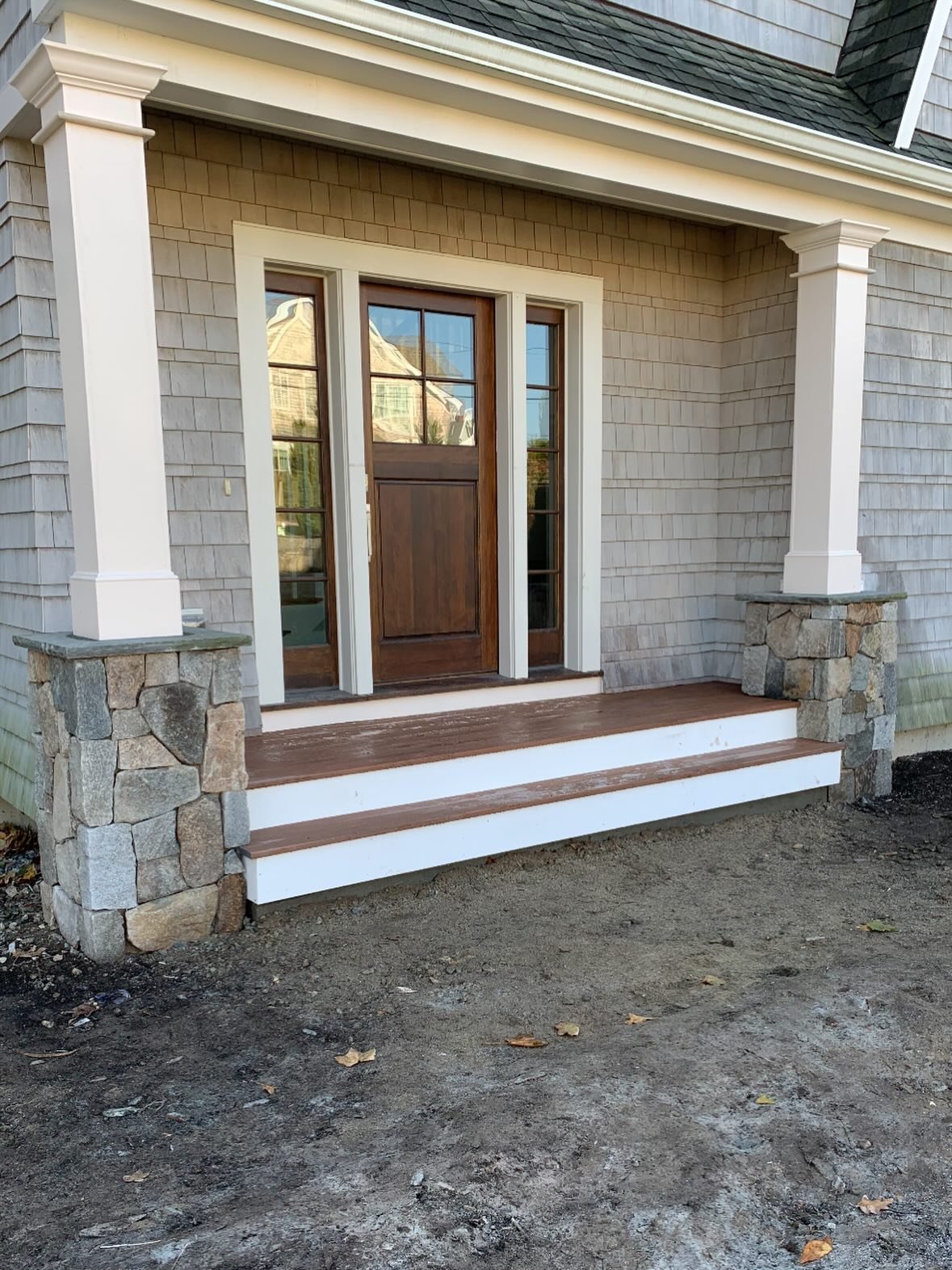 After: Rotted entrance rebuilt in stone and cedar, Gloucester
