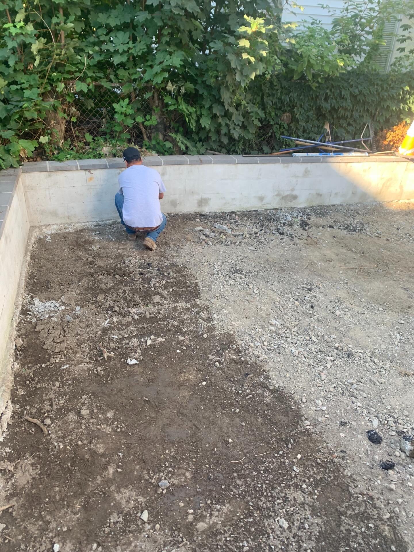 Before: Backyard with turf and a new deck